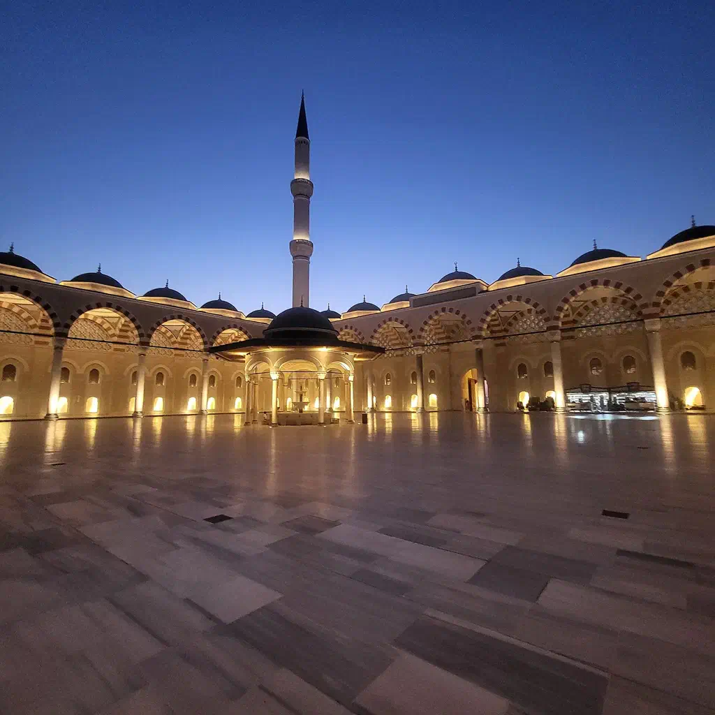 The Grand Çamlıca Mosque, illuminated at night near the tower on Çamlıca Hill