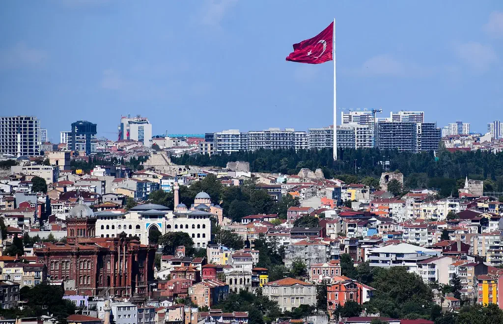 The panoramic view over Istanbul from Çamlıca Hill, marked by the giant Turkish flag