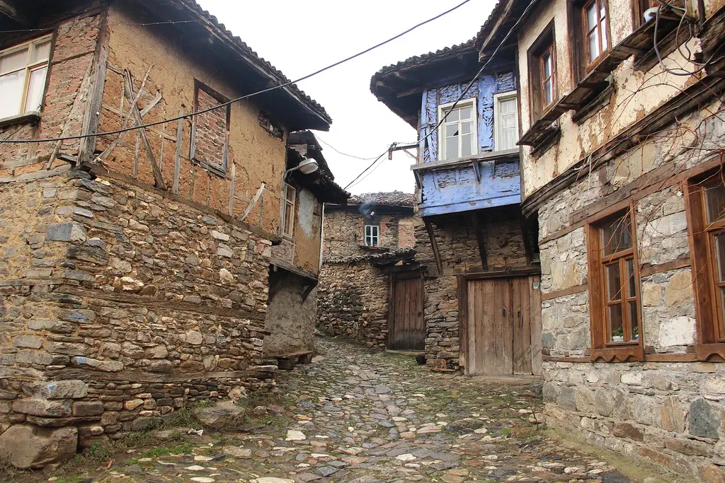 Colourful old Ottoman houses on a cobbled lane in Cumalıkızık village near Bursa