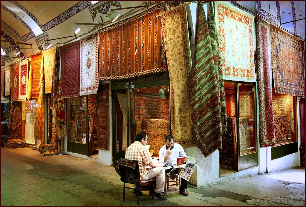 Hanging carpets and kilims in a Grand Bazaar shop in Istanbul, scene of the tea-and-hard-sell trick