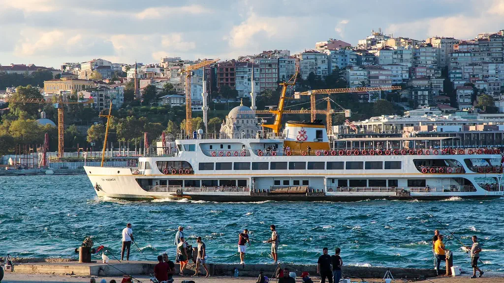 Istanbul’s skyline glowing over the Bosphorus at sunset