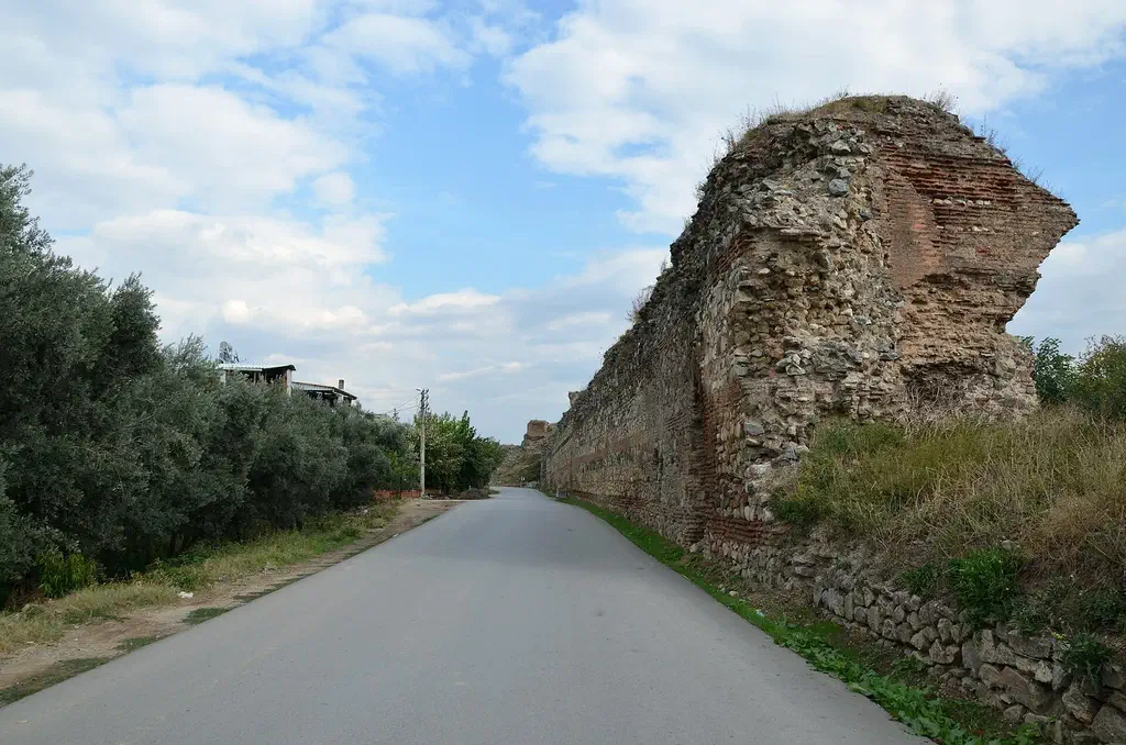 The Roman and Byzantine city walls of ancient Nicaea at Iznik, with stone towers running beside the road